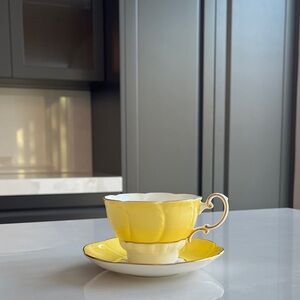 PARAGON Double Warrant Tea Cup and Saucer. Yellow Flower Petal with Gold Gilt.